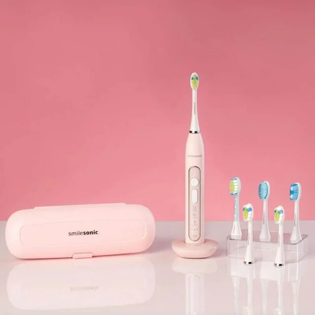 Smilesonic UP Pink — różowy zestaw ze szczoteczką, sześcioma końcówkami, etui i ładowarką