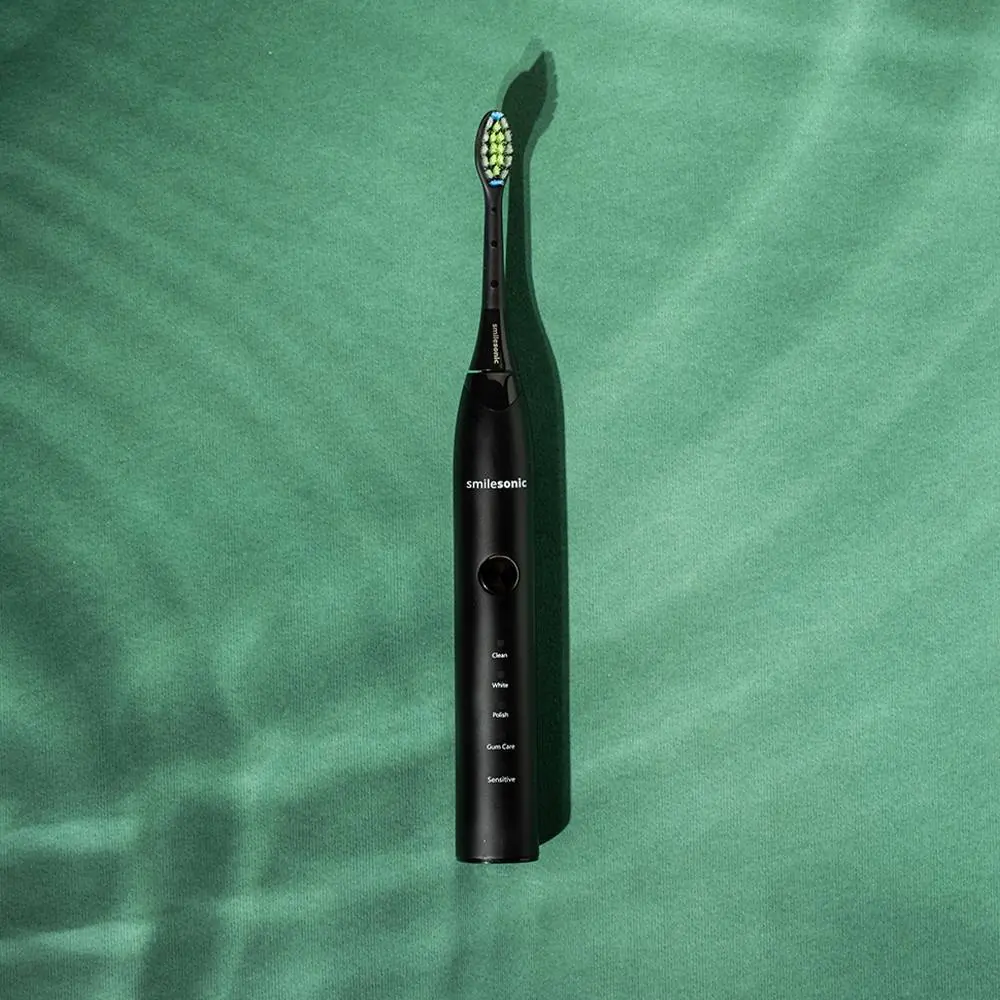 Smilesonic EX Black na zielonym tle